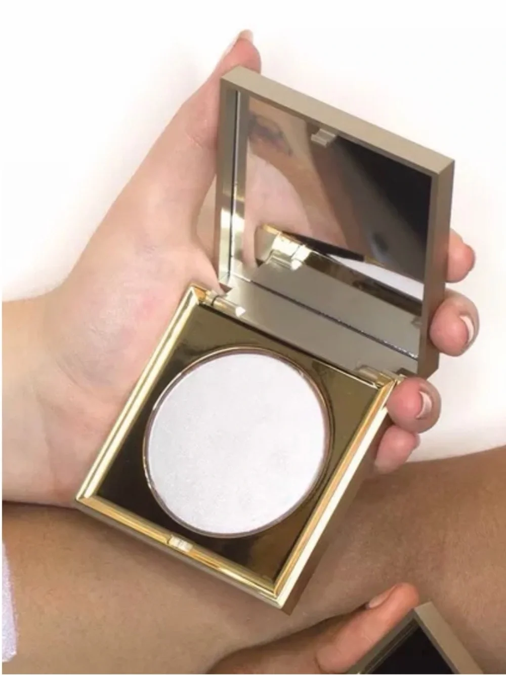 Shimmering Nude light Highlighter in color opulence. Color is posted in photos